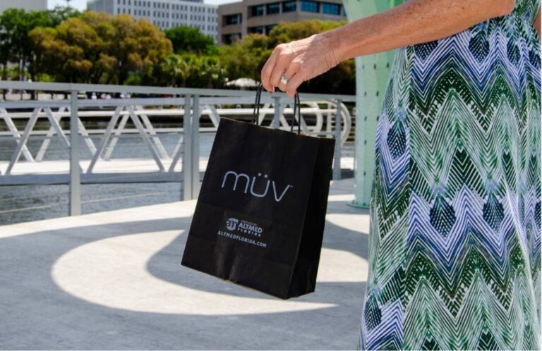 Women Carrying MUV shopping bag